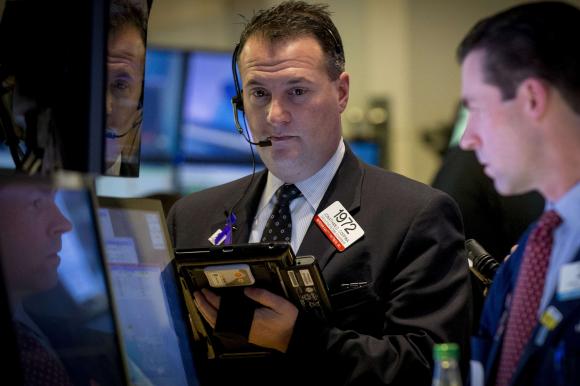 Wall Street falls as oil prices drag
