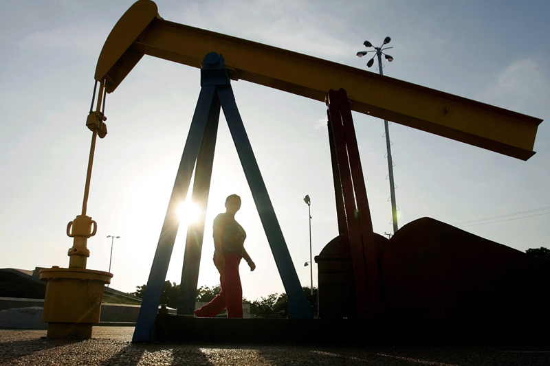 Brent oil futures fall below $58 as stronger dollar weighs