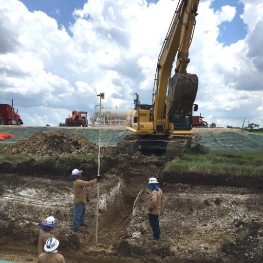 Workers at a Statoil USA site in the Eagle Ford formation prepare to tie in a pipeline extension CREDIT: DAVID GAFFEN/REUTERS