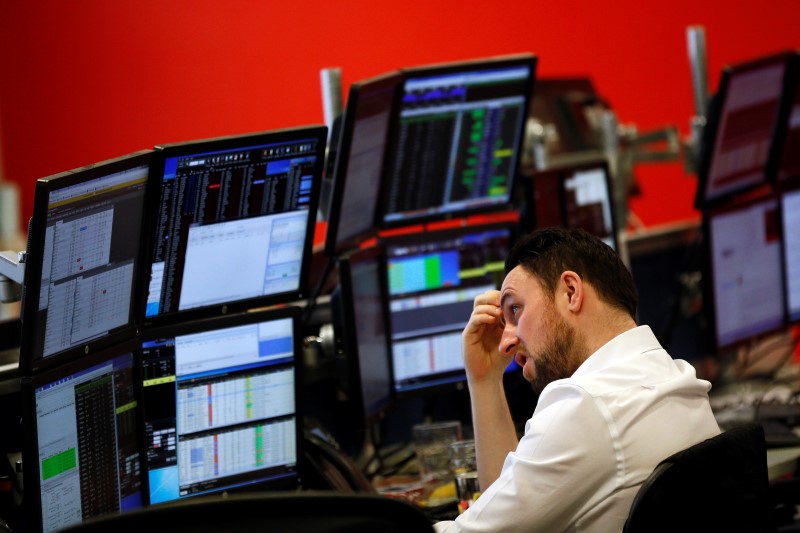 A market maker works on the trading floor at IG Index in London, Britain January 14, 2016. REUTERS/Stefan Wermuth