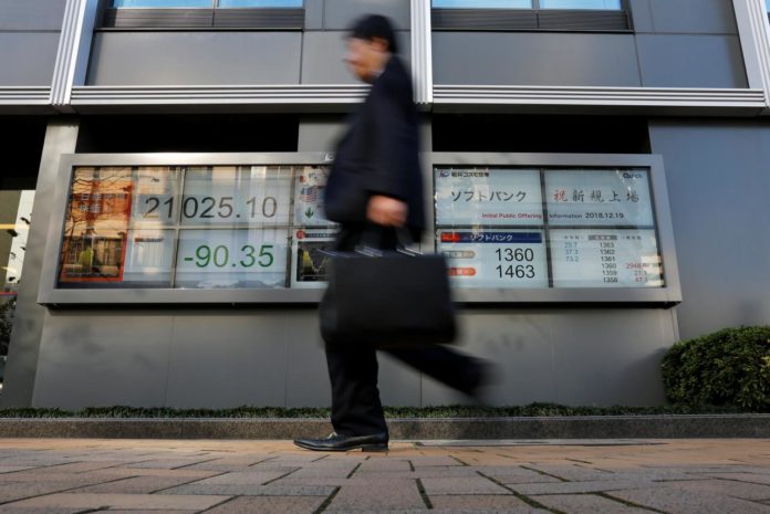 Asian Stocks Slide, Investors Rush To Yen And Bonds
