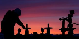 Oil prices ease from June highs on weaker physical market