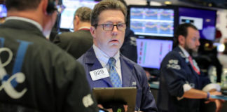 Wall St. Holds On To Gains; Fed Policy Meeting Eyed Wall St. Holds On To Gains; Fed Policy Meeting Eyed