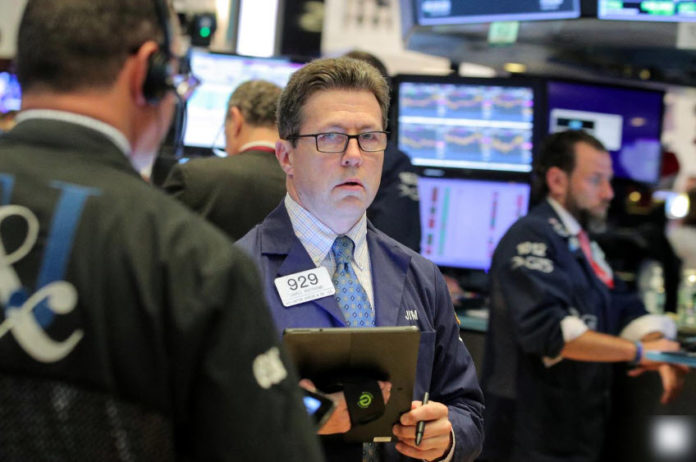 Wall St. Holds On To Gains; Fed Policy Meeting Eyed
