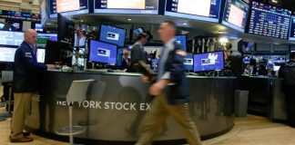 Dow hits record high as financial stocks rise