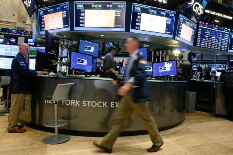 Dow hits record high as financial stocks rise