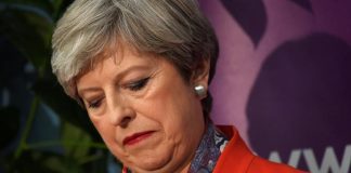 UK election deals May a crushing blow, blurring Brexit talks Britain's Prime Minister Theresa May waits for the result of the vote in her constituency at the count centre for the general election in Maidenhead,