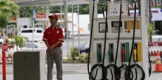 Oil price eases down to $55 per barrel on stronger dollar