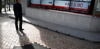 Dollar retreats from 14-year high, banks pull European shares lower Dollar retreats from 14-year high, banks pull European shares lower